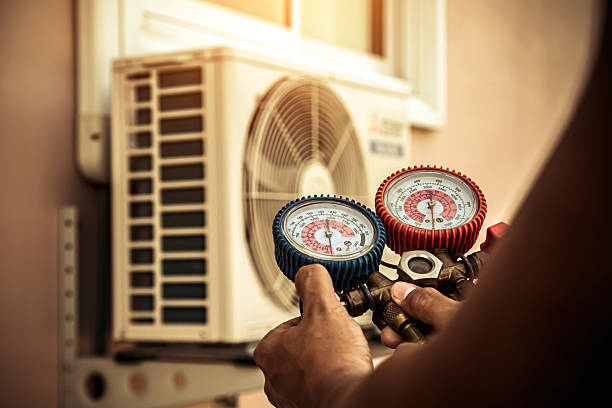 Professional Hvac technician working in Mc Calla, AL